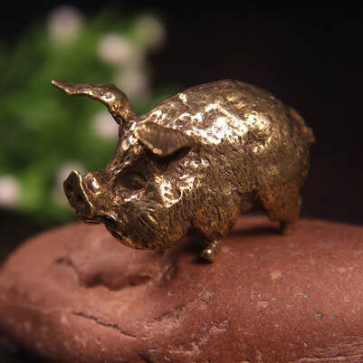 vintage brass pig